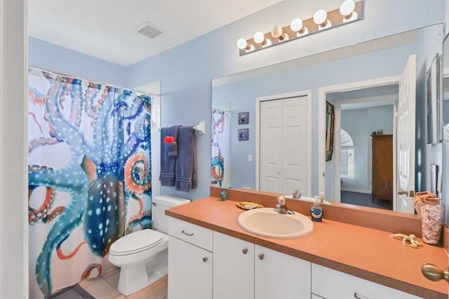 bathroom with vanity, tile patterned flooring, toilet, and a shower with shower curtain