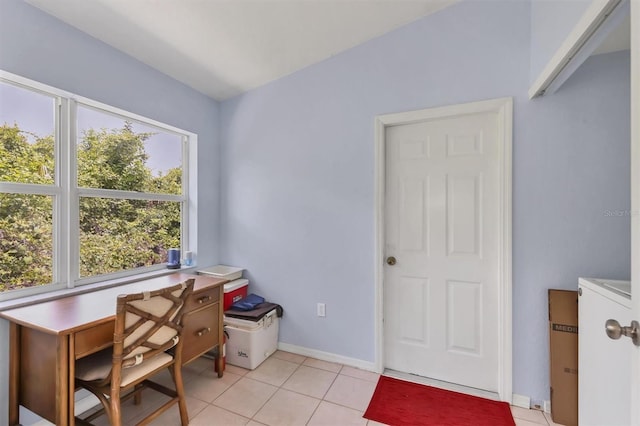 office area featuring light tile patterned flooring