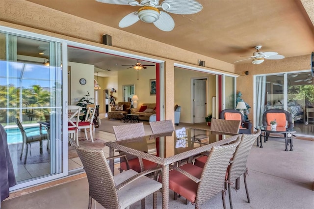 view of patio featuring ceiling fan