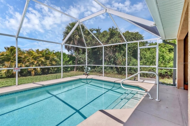 view of pool featuring a lanai and a patio