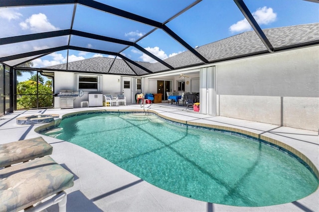 view of swimming pool featuring a patio area, area for grilling, grilling area, a bar, and ceiling fan