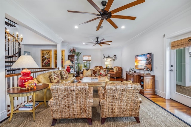 living room featuring crown molding and wood-type flooring