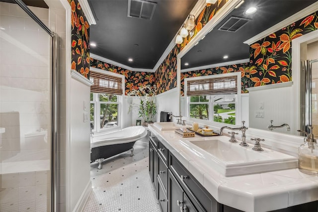 bathroom featuring vanity, crown molding, and independent shower and bath