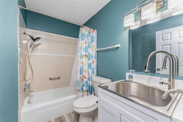 full bathroom with hardwood / wood-style floors, shower / bath combination with curtain, toilet, and vanity