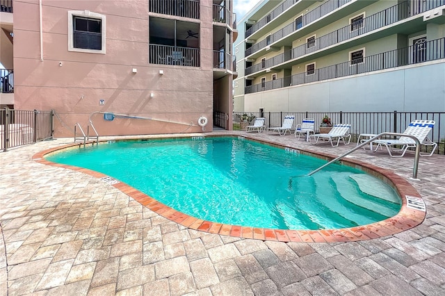 view of pool featuring a patio area