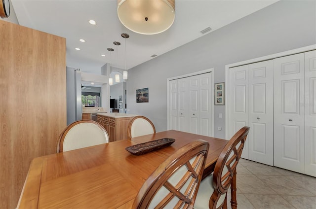 dining area with light tile patterned floors