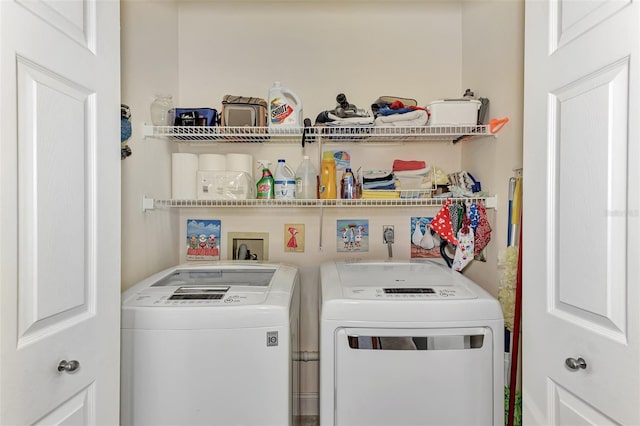 laundry area with washer and clothes dryer