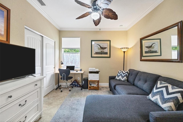 tiled home office featuring ceiling fan and ornamental molding