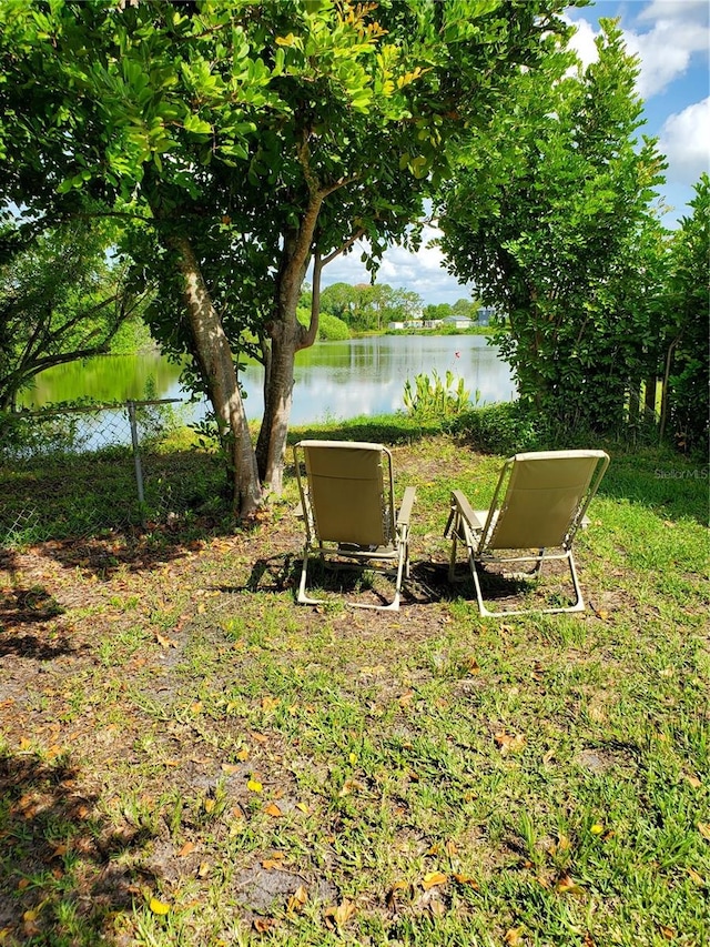 view of yard with a water view