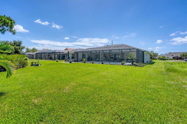 view of yard with a lanai