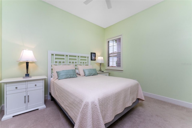 bedroom featuring ceiling fan and light colored carpet