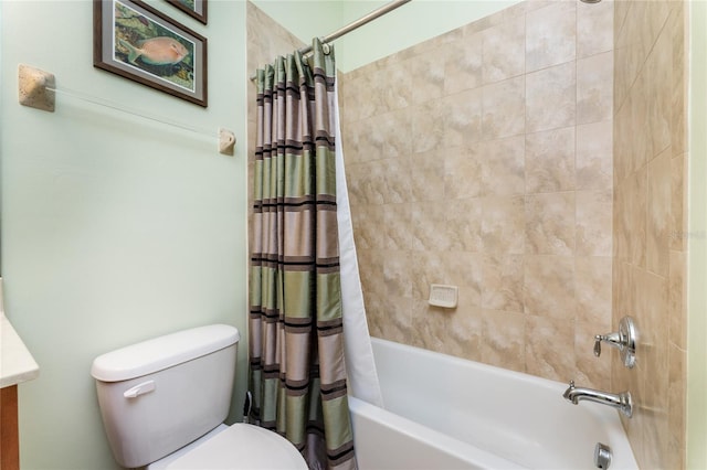 full bathroom featuring shower / bath combination with curtain, toilet, and vanity