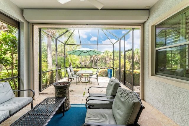 sunroom / solarium featuring a wealth of natural light