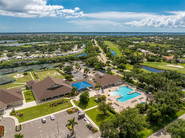 birds eye view of property featuring a water view