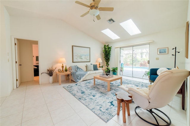 tiled living room with lofted ceiling and ceiling fan