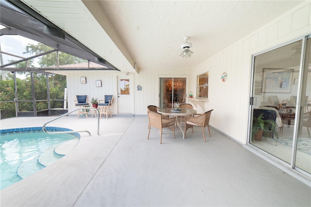 view of pool featuring a lanai and a patio area