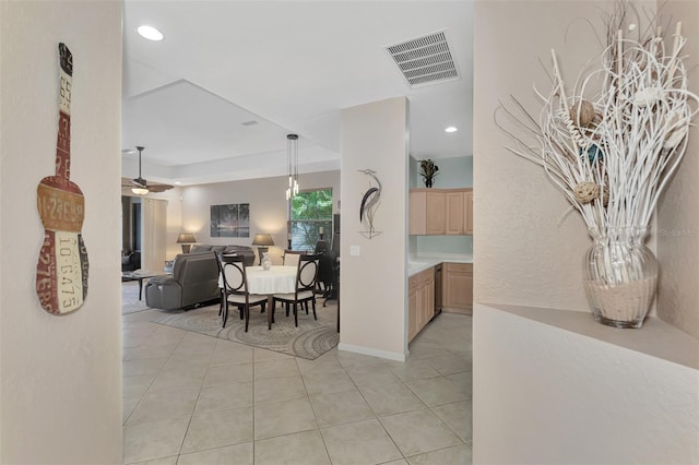 hallway featuring light tile patterned floors