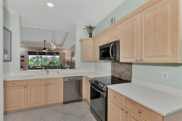 kitchen with tasteful backsplash, ceiling fan, sink, light tile patterned flooring, and stainless steel appliances