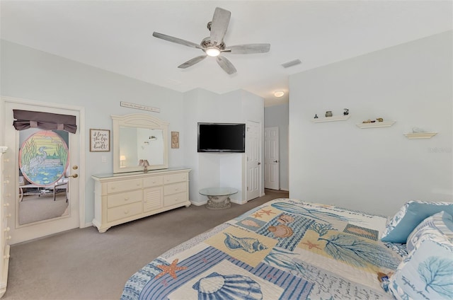 bedroom with ceiling fan and carpet floors