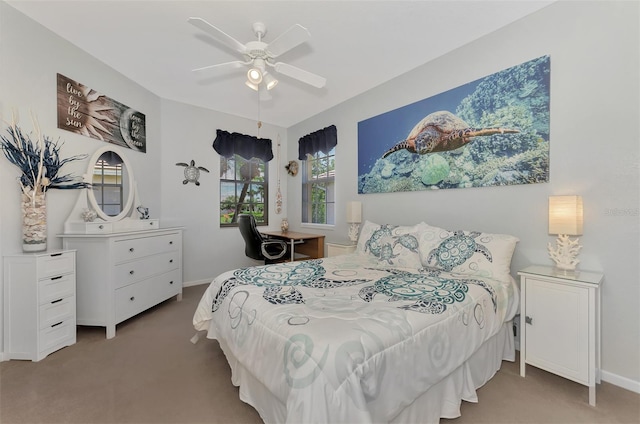 bedroom with ceiling fan and carpet