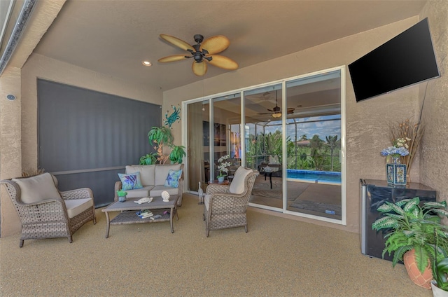 exterior space with ceiling fan and outdoor lounge area