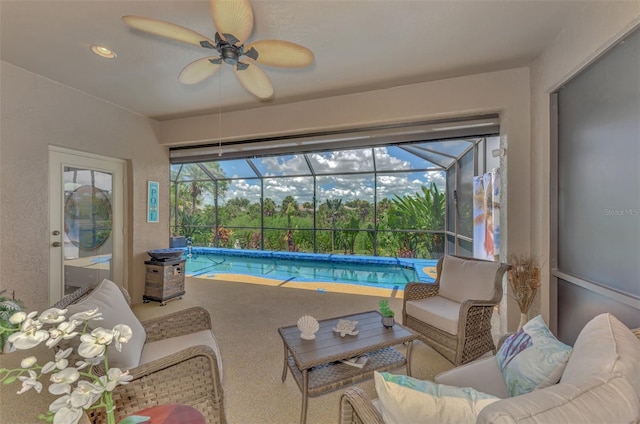 view of swimming pool with ceiling fan