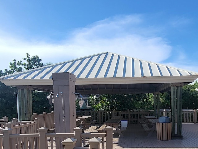 view of home's community with a deck and a gazebo