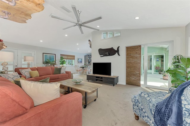 living room with light carpet, ceiling fan, french doors, and high vaulted ceiling