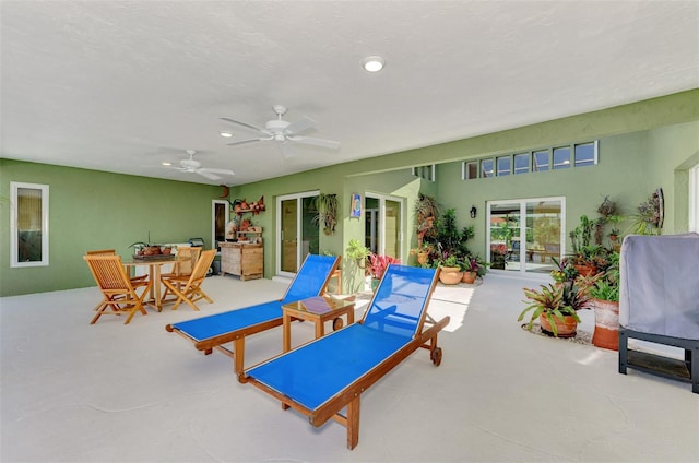 view of patio featuring ceiling fan