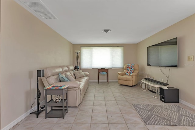 living room featuring light tile patterned flooring