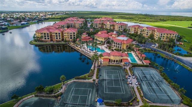 birds eye view of property featuring a water view