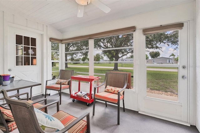 sunroom / solarium with vaulted ceiling and ceiling fan