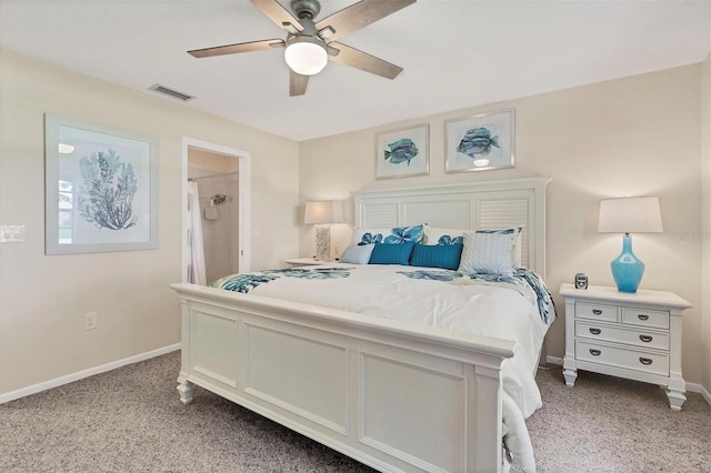 bedroom with ceiling fan and light carpet