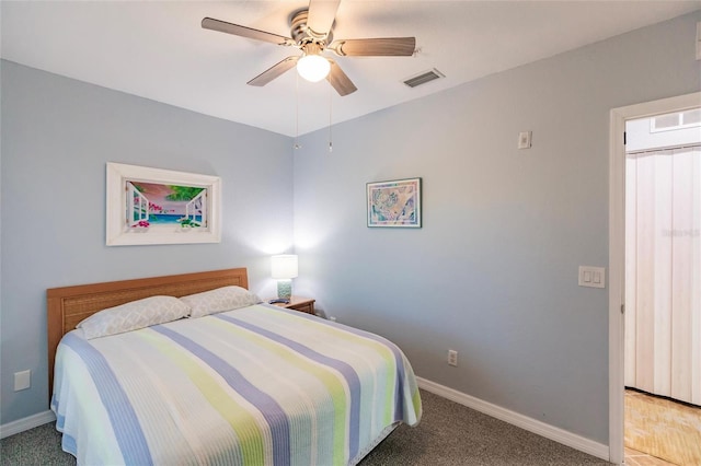 carpeted bedroom featuring ceiling fan