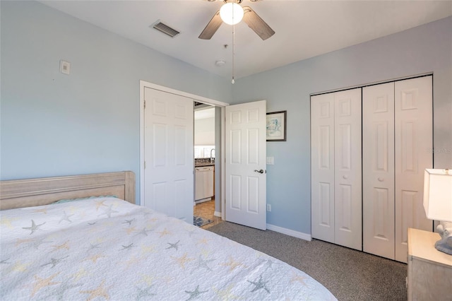 carpeted bedroom with a closet and ceiling fan