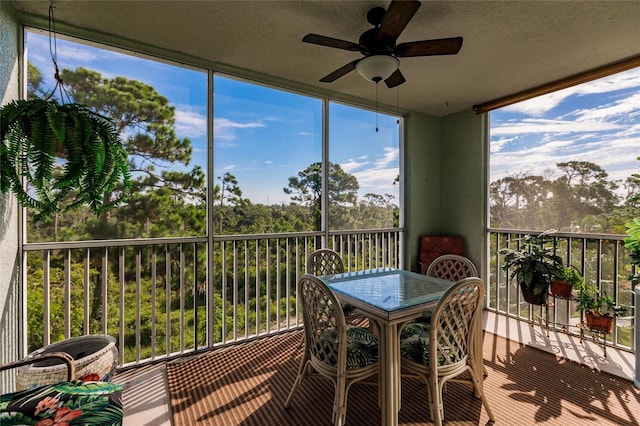 sunroom / solarium with ceiling fan