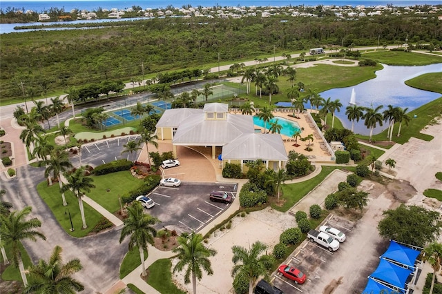 birds eye view of property featuring a water view