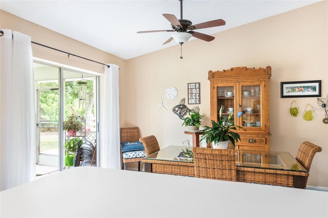 dining space featuring ceiling fan