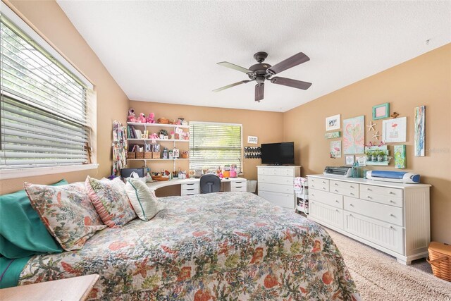 bedroom featuring carpet and ceiling fan