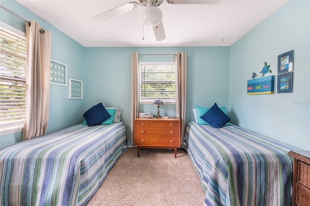 bedroom featuring carpet and ceiling fan