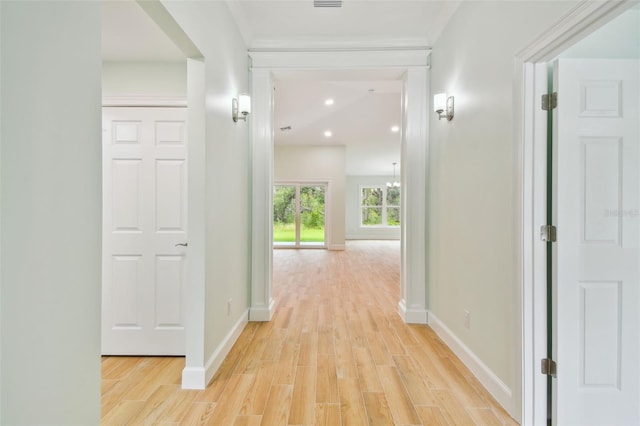 hall with light hardwood / wood-style flooring