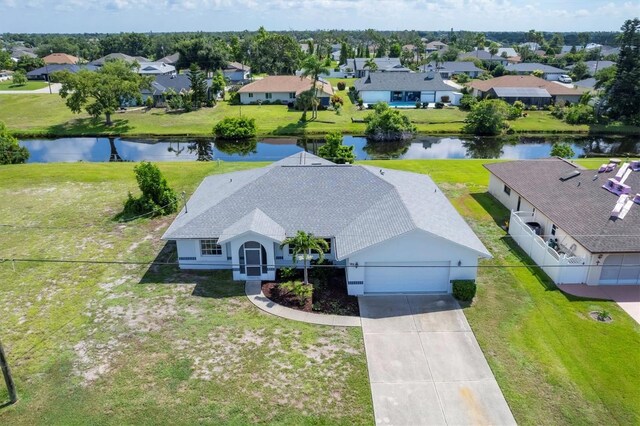 drone / aerial view featuring a water view