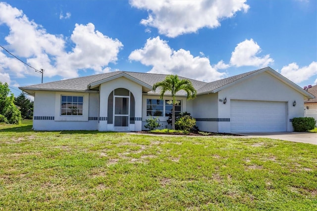 single story home with a garage, concrete driveway, a front lawn, and stucco siding