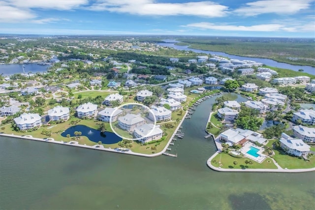 bird's eye view with a water view