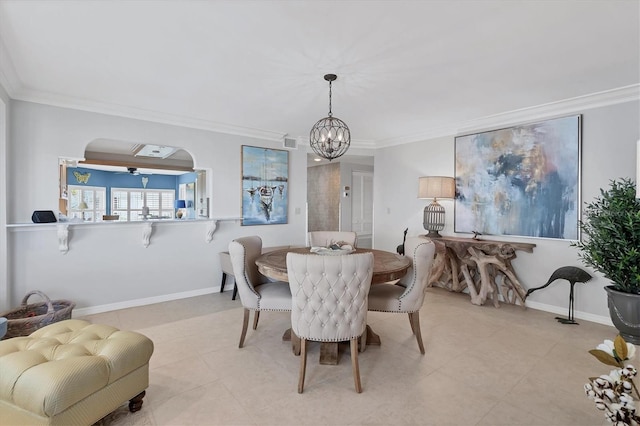 dining space with baseboards, visible vents, arched walkways, and crown molding