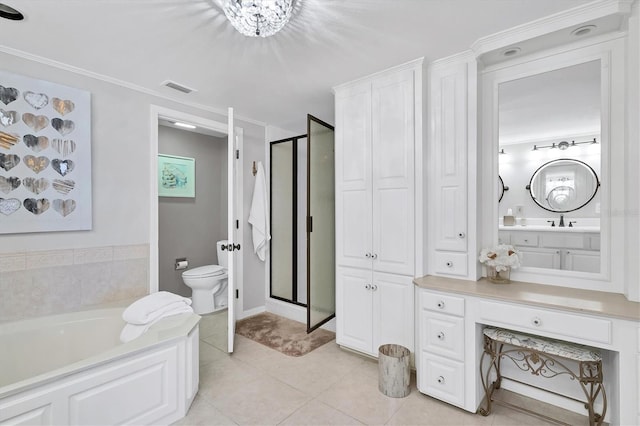 full bathroom with a garden tub, a stall shower, vanity, and visible vents