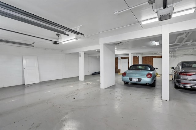 parking deck featuring a garage door opener