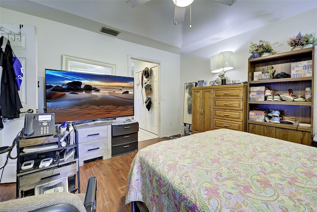 bedroom featuring hardwood / wood-style floors and ceiling fan