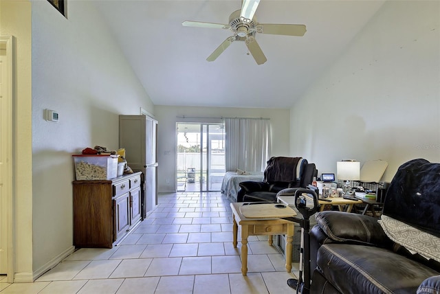 office space with high vaulted ceiling, ceiling fan, and light tile patterned floors