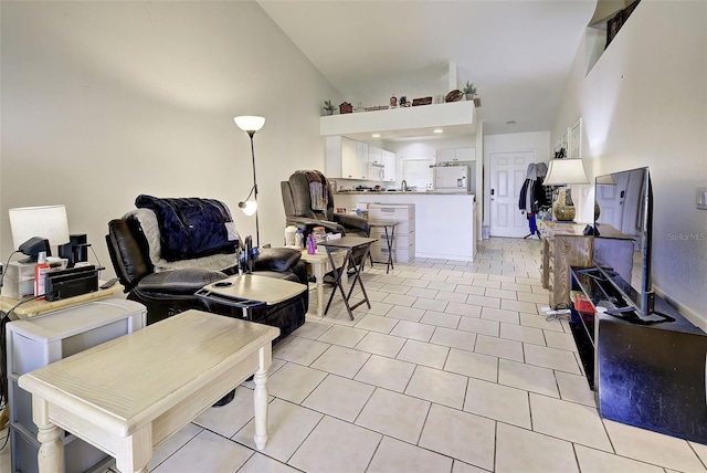 tiled living room featuring vaulted ceiling